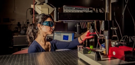 Biomedical Engineering student working with lasers.