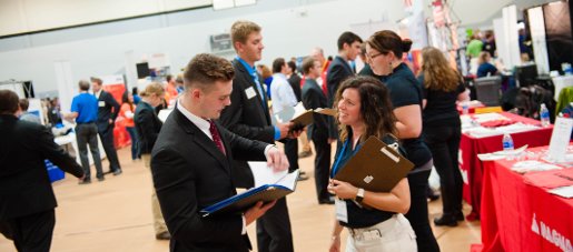 Students and employers talking during the Career Fair.