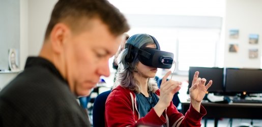 Michigan Tech students using virtual reality glasses.