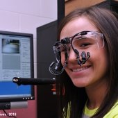 Student with eye scan technology, 2013