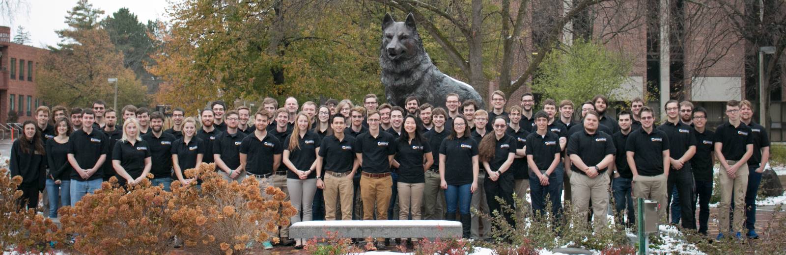 Aerospace Enterprise in front of the Husky Statue