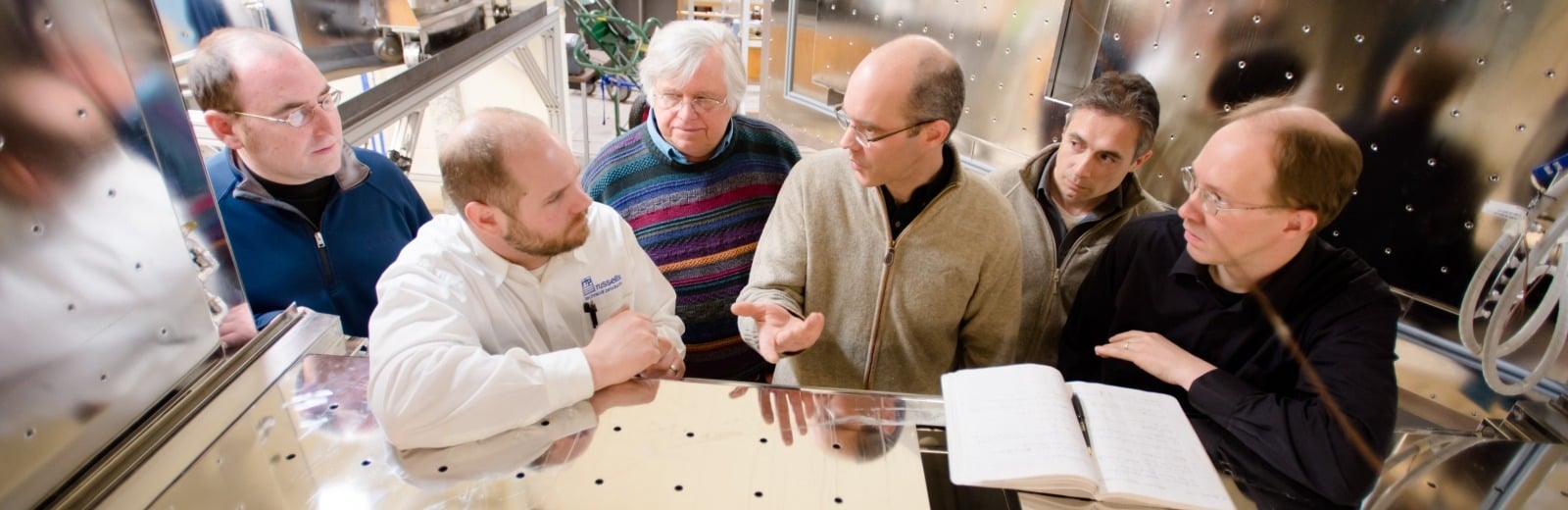 Six researchers discuss inside the Cloud Chamber lab