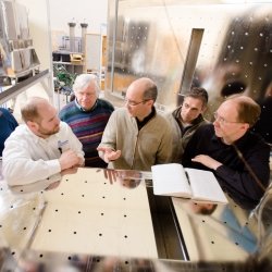 Six researchers discuss inside the Cloud Chamber lab