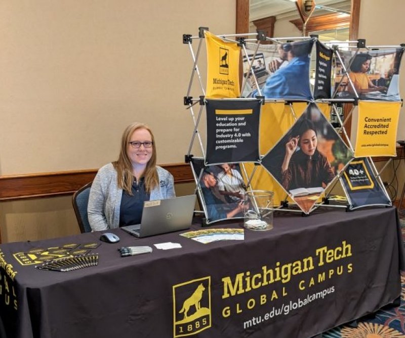Amanda Irwin, the Graduate Admissions Advisor for Global Campus, representing Michigan Tech at an event.
