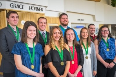 Graduates in honors medals