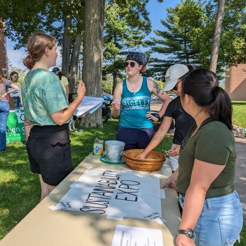 Students gather at a Sustainability Expo on campus