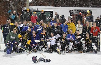 Group of broomball players.