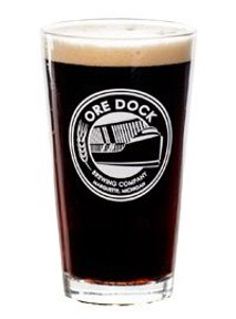 Ore Dock Brewing Company pint filled with beer.
