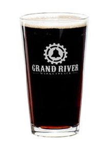Grand River Distillery and Brewery pint filled with beer.