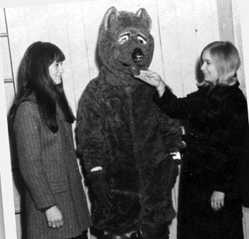 Vintage unofficial bear mascot with two female fans.