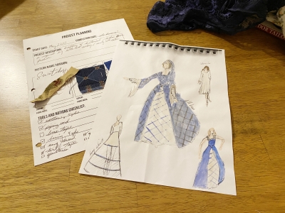 Sketches and a written description of a Tudor dress.