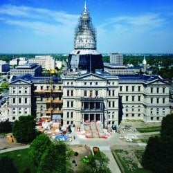 Aerial view of construction taking place around the Michigan State Capitol Building.