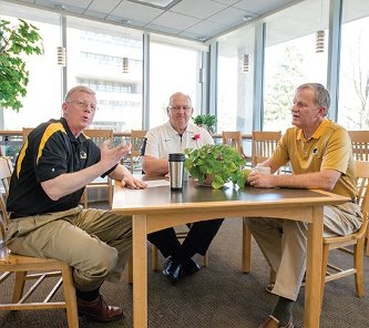 "Through this campaign, so many people have come to see Michigan Tech as a place of consequence," says Vice President for Advancement Shea McGrew, left, during a conversation with Tech Fund Chair George Butvilas, center, and President Glenn Mroz.