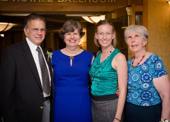 Left to right, Tom Irwin, Marie Cleveland, Jillian Rothe, and Martha Sloan gather at the 2014 Alumni Awards Banquet. George and Susan Robinson are not pictured