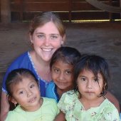 Peace Corps student with three children.