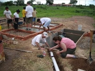 EWB team working on a septic system they designed for a school in Bolivia