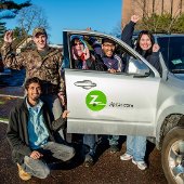 Students with a zip car.