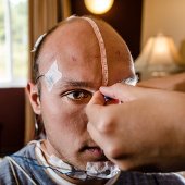 Person being measured for sleep study.