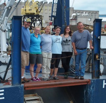 Barnard (left) and the University-National Oceanographic Laboratory System (UNOLS) team on the deck of the R/V Blue Heron.