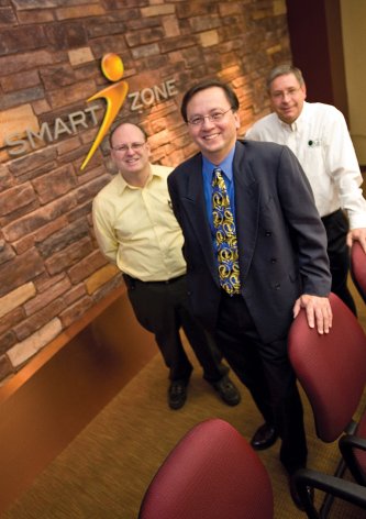 Left to right, Steve Fitzgerald of Consistacom, SmartZone CEO Carlton Crothers, and Glen Simula of GS Engineering Left to right, Steve Fitzgerald of Consistacom, SmartZone CEO Carlton Crothers, and Glen Simula of GS Engineering