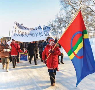 Sámi people protest plans to build an open-pit iron mine that would disrupt their reindeer's grazing and migration.