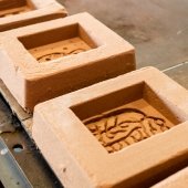 Sand bond plaques molded during the 2022 SYP program