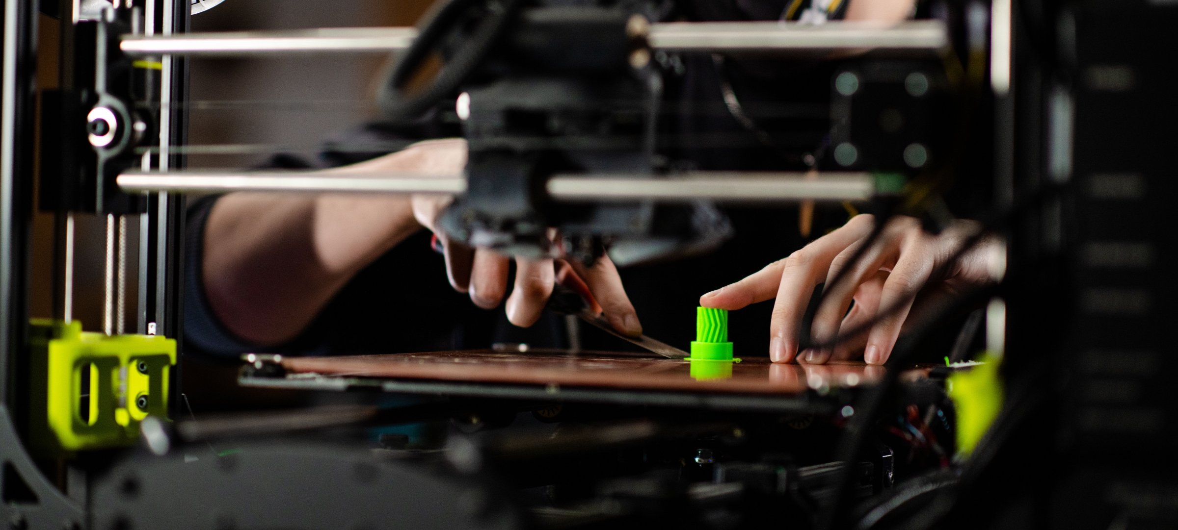 3D printed intem being taken off the printer platform