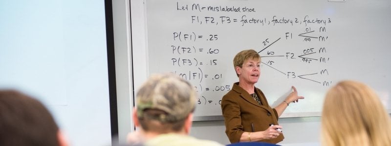 Dr. Beth Reed lecturing in a Statistics course