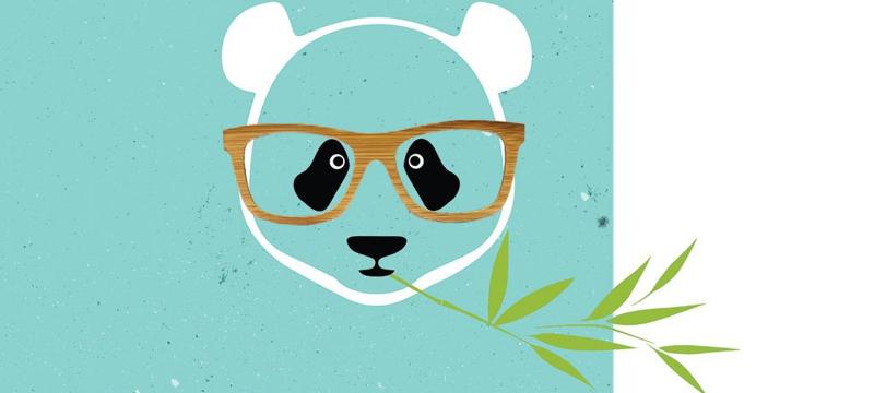 Illustrated panda with bamboo in its mouth wearing a pair of wooden glasses.