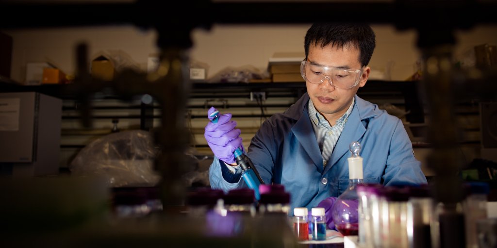 Xiaohu Xia, a Michigan Tech chemist, led a team that improved cancer-detecting test strips by adding a thin layer of platinum to gold nanoparticles.