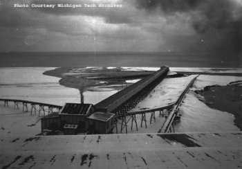 A historic photo of the sluiceway at Gay on the shore of the lake.
