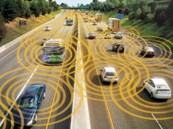Cars drive on a divided highway and concentric circles show how connected traffic might interact.