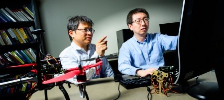 Researcher Bo Chen, left, and his graduate student mentee Niusen Chen have been working together for six years on a breakthrough capability designed to make mobile devices more secure.
