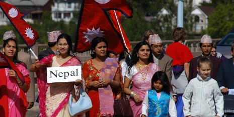 Community residents from Nepal showcase the traditional clothing of their homeland during a past Parade of Nations. 