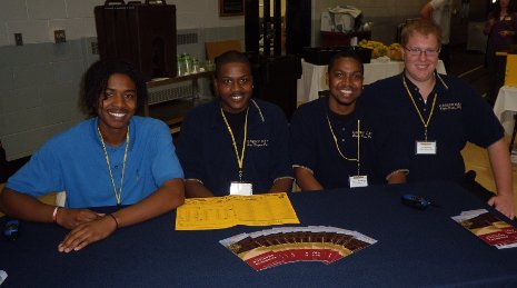Alpha Kappa Psi, professional business fraternity, helped stage the Career Fair. From left: Jonathan  Clifton, Shandre Huff, Keshon Moorehead, and Tom Brindley.