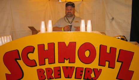 Chas Thompson of Schmohz Brewery at the alumni tailgate party in Grand Rapids.