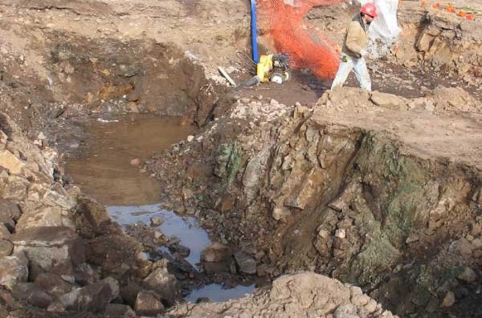 Water soon filled the mine shaft. Photo courtesy of the Daily Mining Gazette.