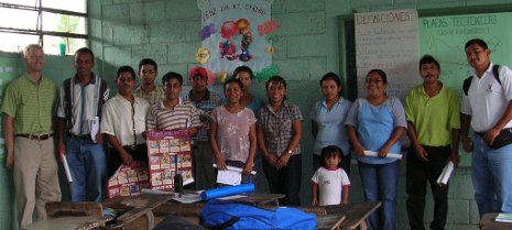 Geology graduate student John Lyons, far left, educates students in Guatemala about earthquakes.