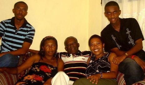 Fredline Ilorme (2nd from right), her parents and brothers in Haiti