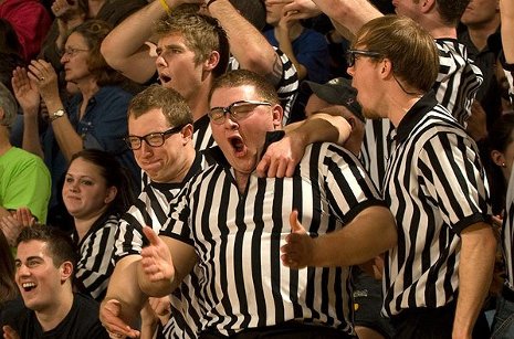 Students "help" the referees during the game and lead cheers nonstop.