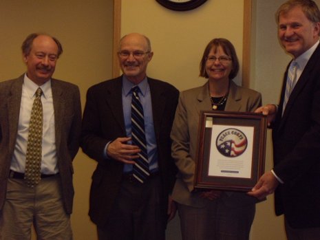 Peace Corps official Eric Goldman, visits Tech to recognize Michigan Tech's Master's International Programs. Pictured, left to right, are forestry professor Blair Orr, Goldman, Graduate Dean Jackie Huntoon, and President Glenn D. Mroz.
