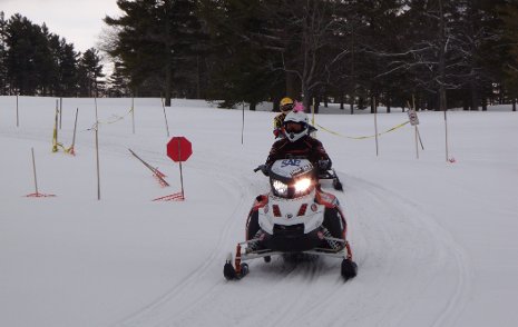 The University of Wisconsin-Platteville finishes the 2011 Clean Snowmobile Challenge Endurance Run.