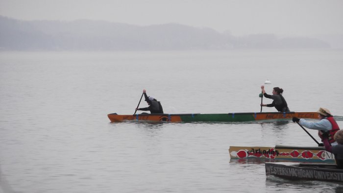 Michigan Tech's canoe, Mesektet, pulls ahead of the competition during regional Concrete Canoe races in Sutton's Bay. Sarah Reed photo