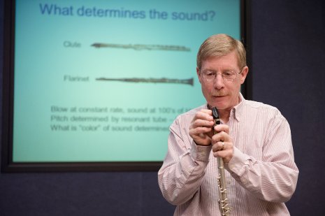 Bryan H. Suits demonstrating his hybrid clarinet/flute