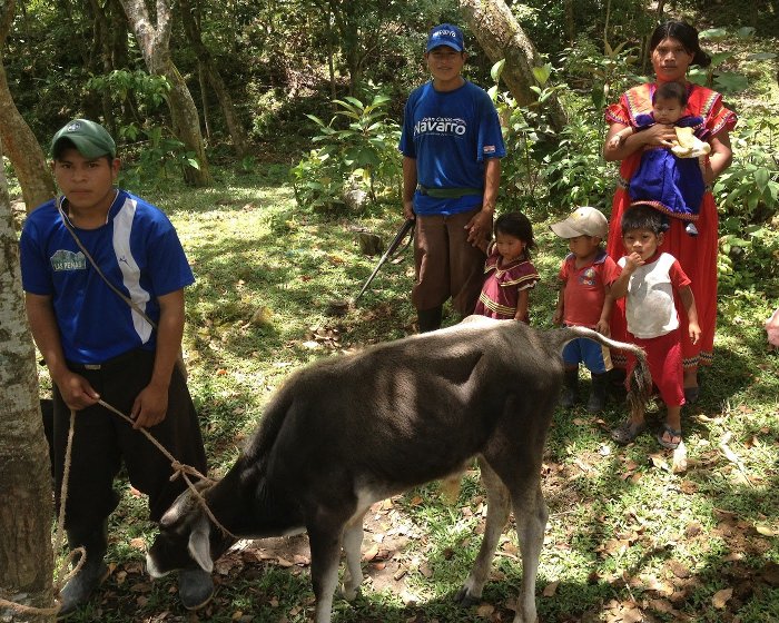 Villagers Chet Hopp helps families like this one in Panama understand volcanic hazards and improve their water and sanitation.