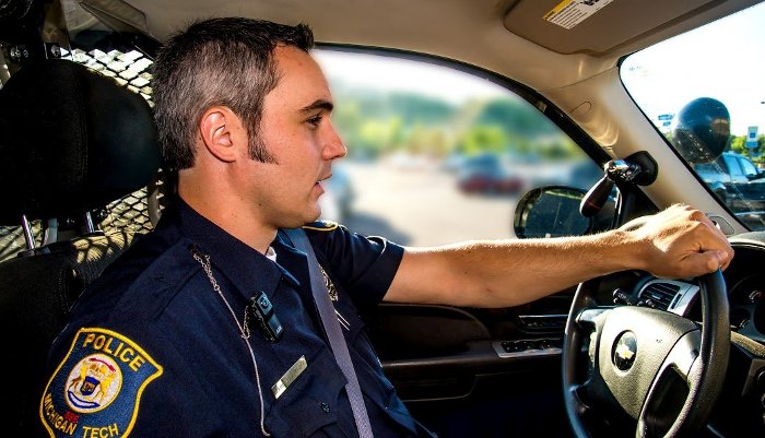 Public Safety Lapel Camera Officer Marc Geborkoff sports one of Public Safety's new digital video cameras on his uniform's lapel.