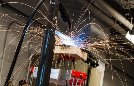 A new 3D metal printer in action in the School of Technology machine shop at Michigan Tech. Chenlong Zhang photo