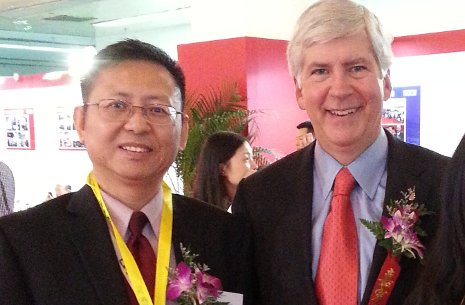 Xiaodi "Scott" Huang in China with Michigan Governor Rick Snyder.