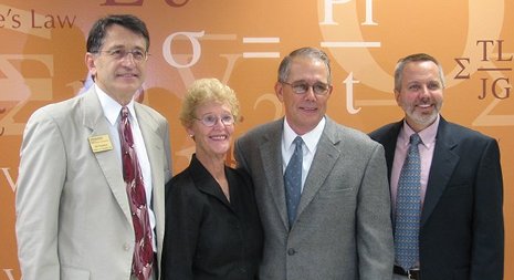 John '64 '69 and Cathi Drake, center, with department chair William Predebon, left, and Professor Gordon Parker, right, who holds the new Drake Endowed Chair in Mechanical Engineering-Engineering Mechanics.