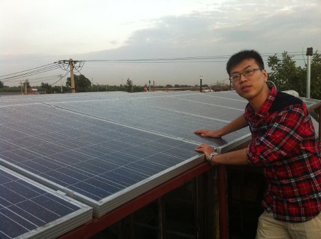 Solar in Zao Yuan Yawei Wei inspects the solar panels he and his family installed on his cousin's roof in the rural Chinese community of Zao Yuan.